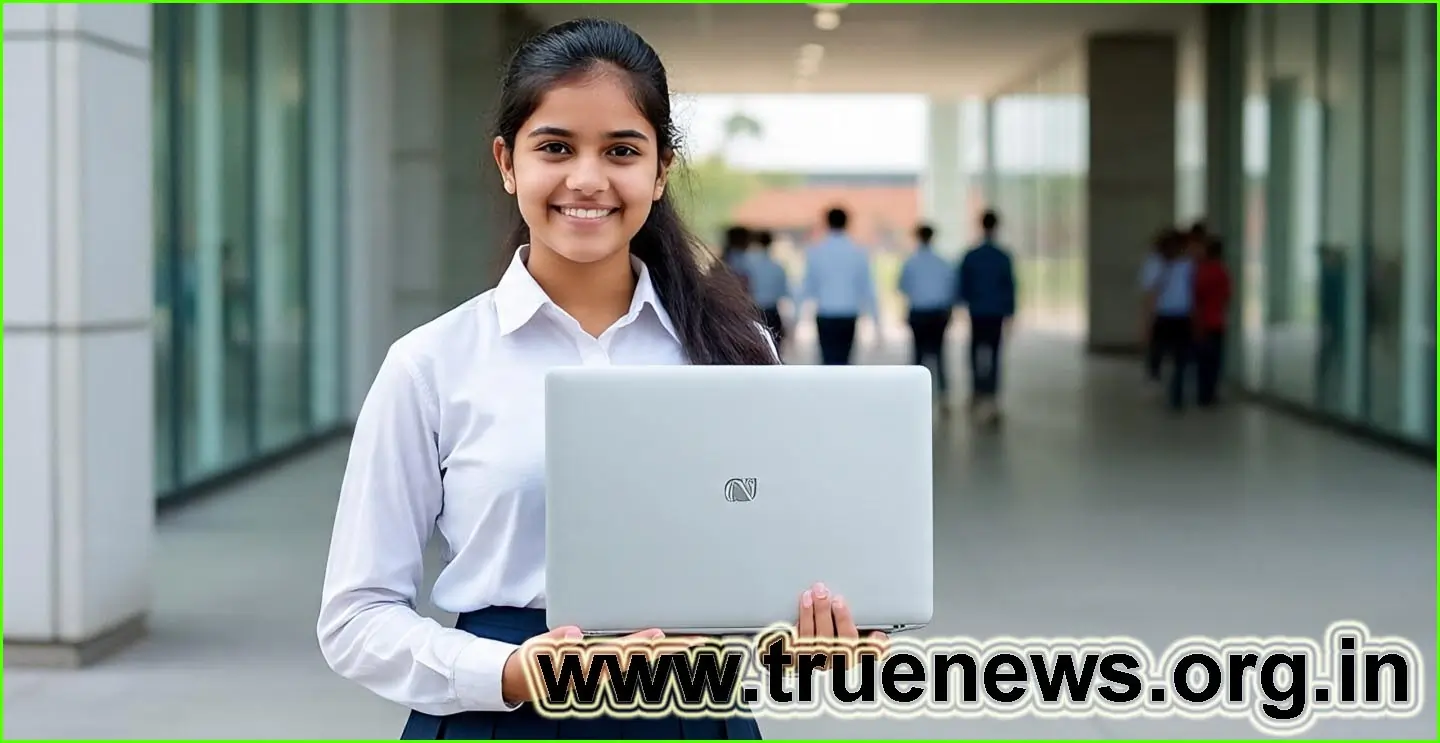 Student holding new laptop from Free Laptop Yojana 2025